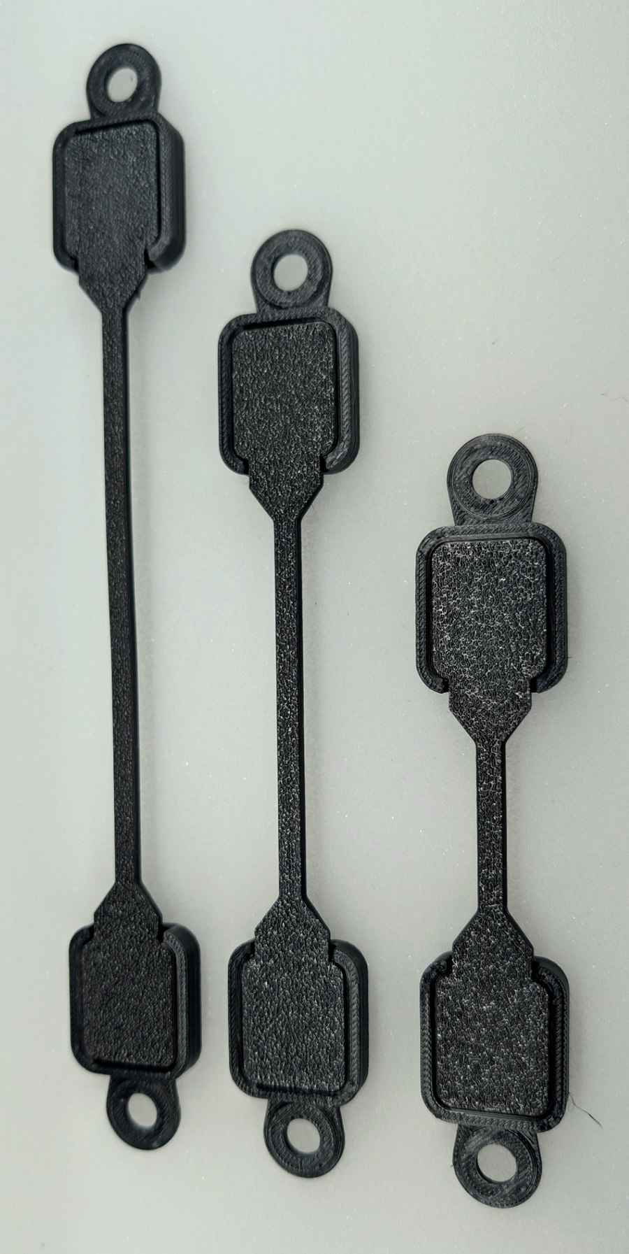 Three assembled Standard FlexCord bridges.